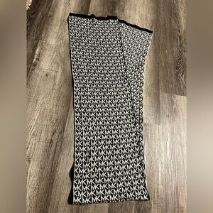 Michael Kors Winter Scarf MK Logo. Black and gray in color.
